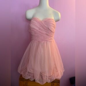 Blush Colored Strapless Mini Prom Dress.
